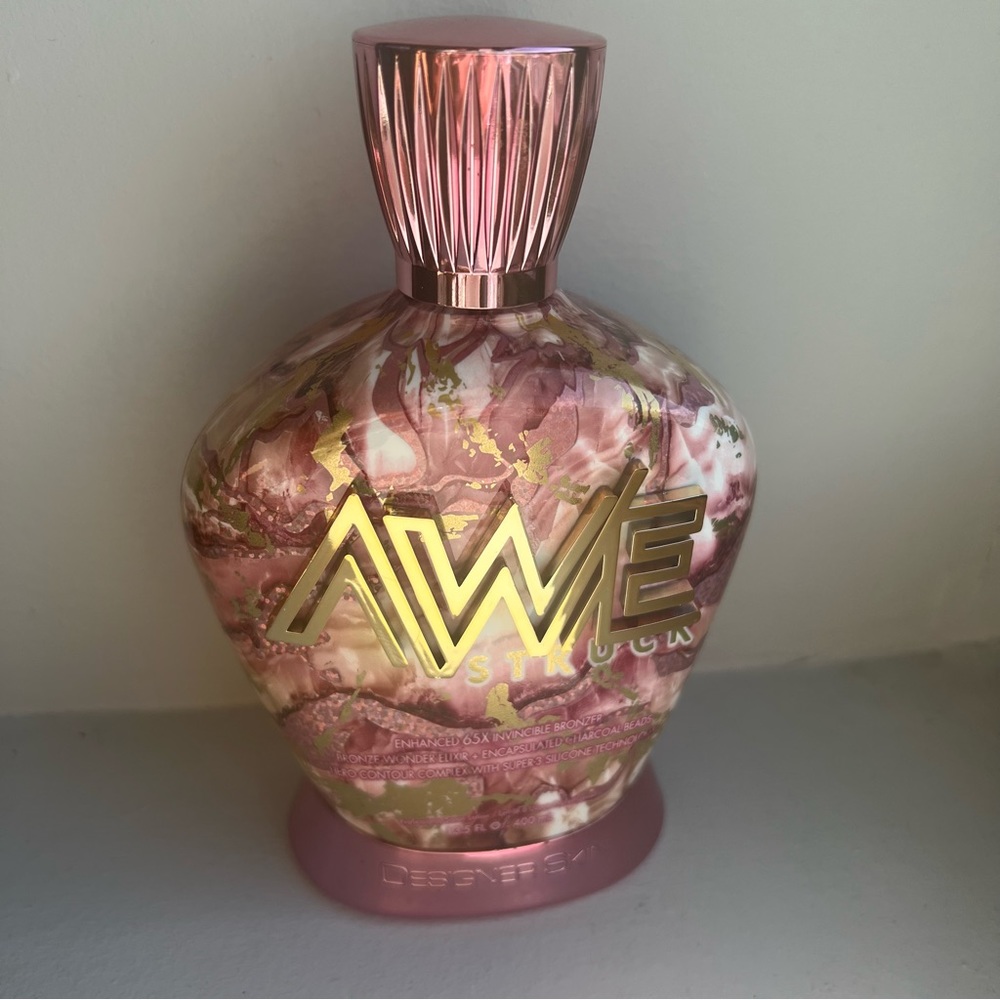 Designer Skin Awestruck Enhanced 65X Invincible Bronzer Tanning Lotion.